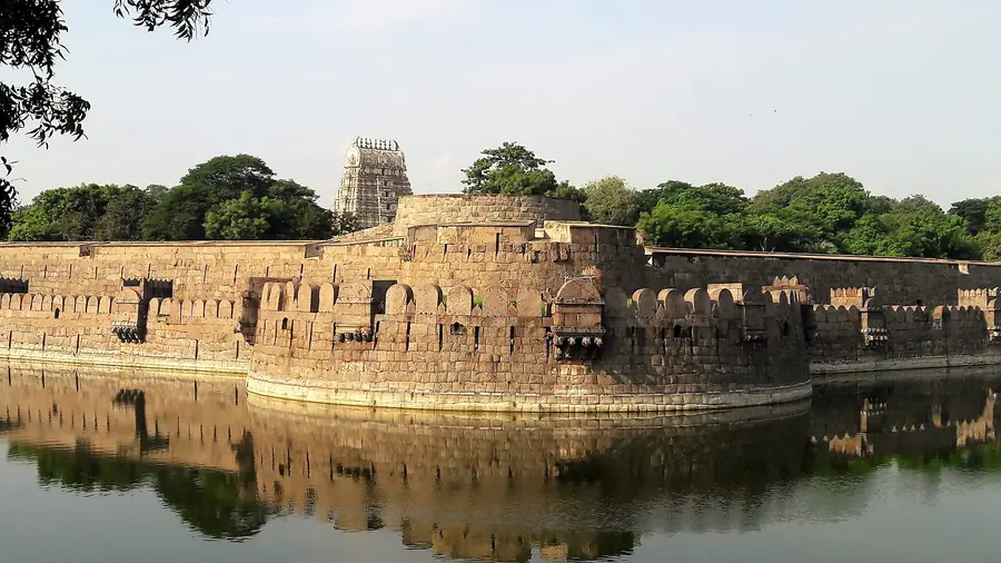 Vellore Fort walls and moat with the Jalakandeswarar temple gopuram behind
